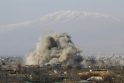 Dūmai kyla po sprogimo Damasko priemiestyje.