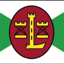 Simbolika: Lindenau laivų statyklos vėliava su herbu centre, kuris išliko nuo Klaipėdos laikų.