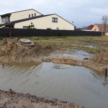 Gyventojai skundžiasi apsemta gatve: gyvena lyg Venecijoje