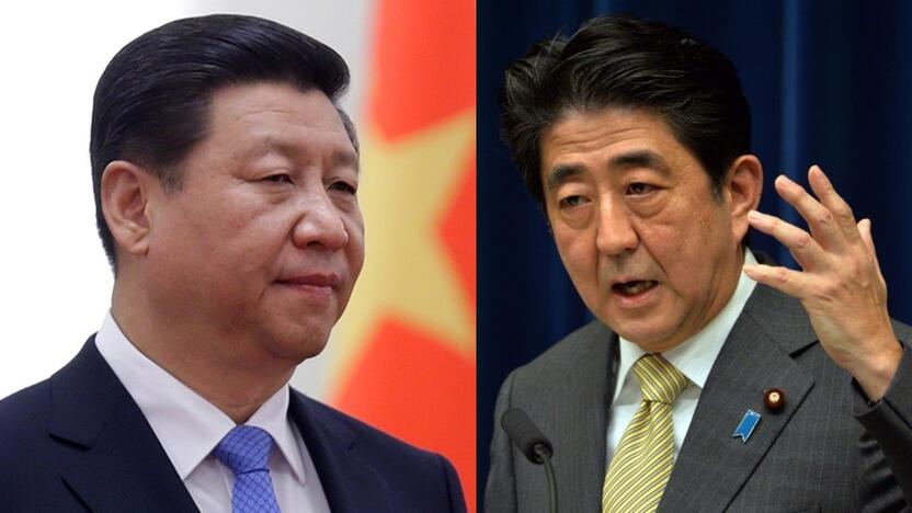 Xi Jinpingas ir Shinzo Abe 