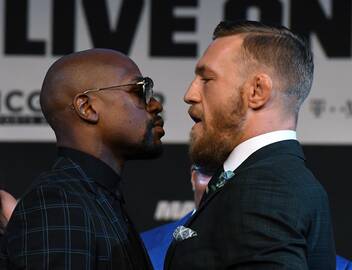 Floydas Mayweatheris ir Conoras McGregoras.