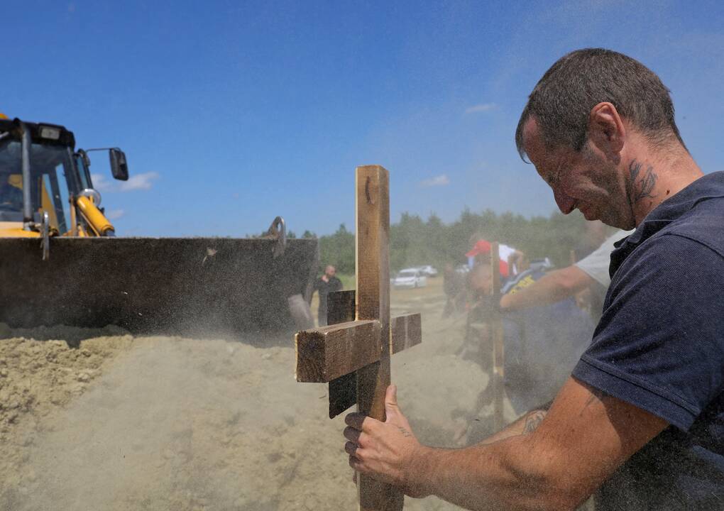 NVO: smarkiai padaugėjo palaidojimų Rusijos užimtose Ukrainos teritorijose