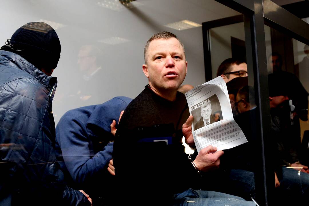 Dailius Dargis (centre)