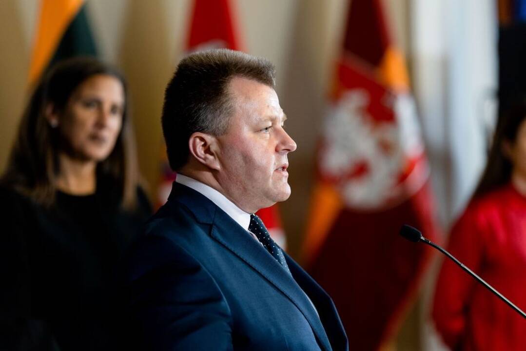 M. Adomėnas.