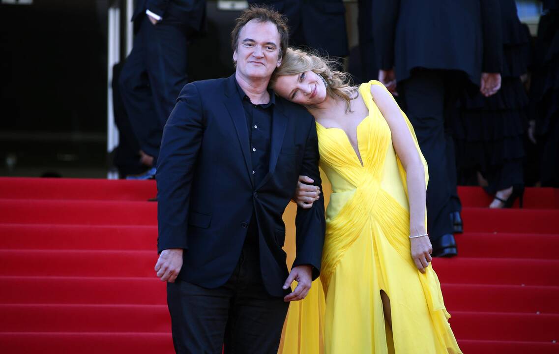 Režisierius Q. Tarantino ir aktorė  Uma Thurman, svariai prisidėję prie filmo „Bulvarinis skaitalas“ sėkmės.