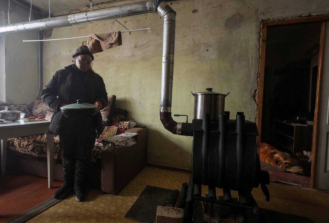 Milijonai ukrainiečių palikti be šildymo, vandens ir elektros: žiema taps masinio naikinimo ginklu?
