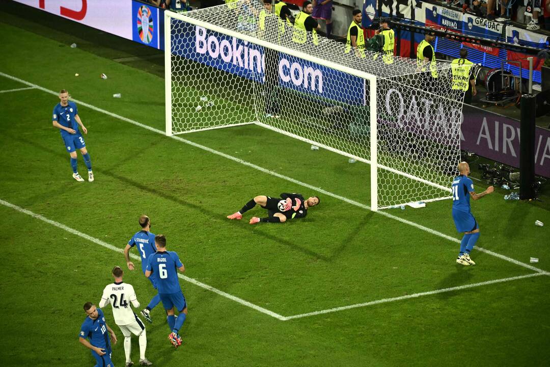 Anglijos ir Slovėnijos rinktinių rungtynių momentas