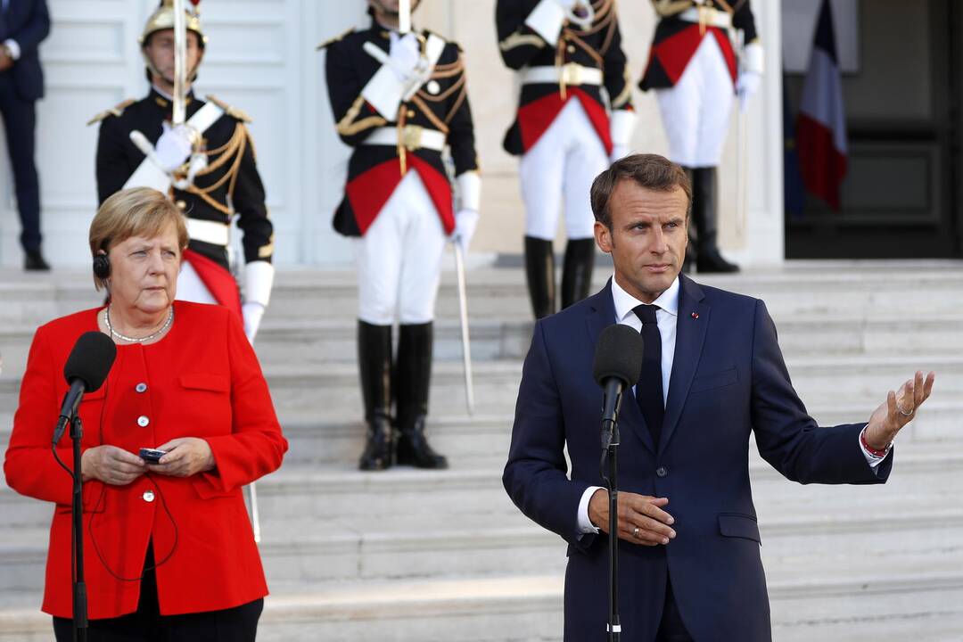 Emmanuelis Macronas  ir Angela Merkel