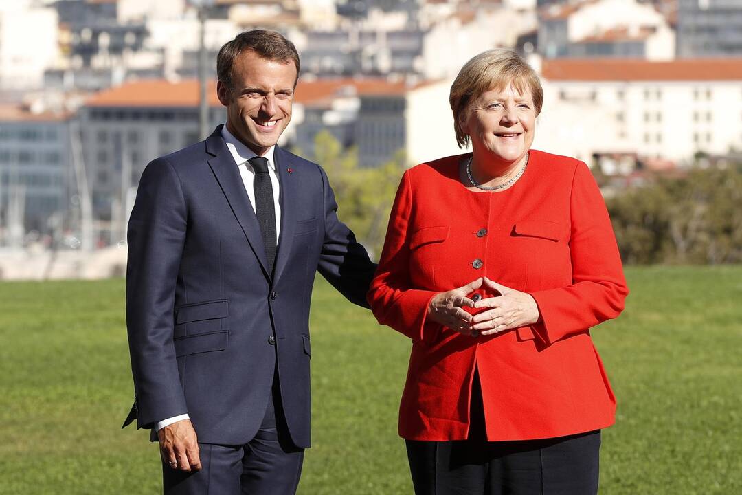 Emmanuelis Macronas  ir Angela Merkel