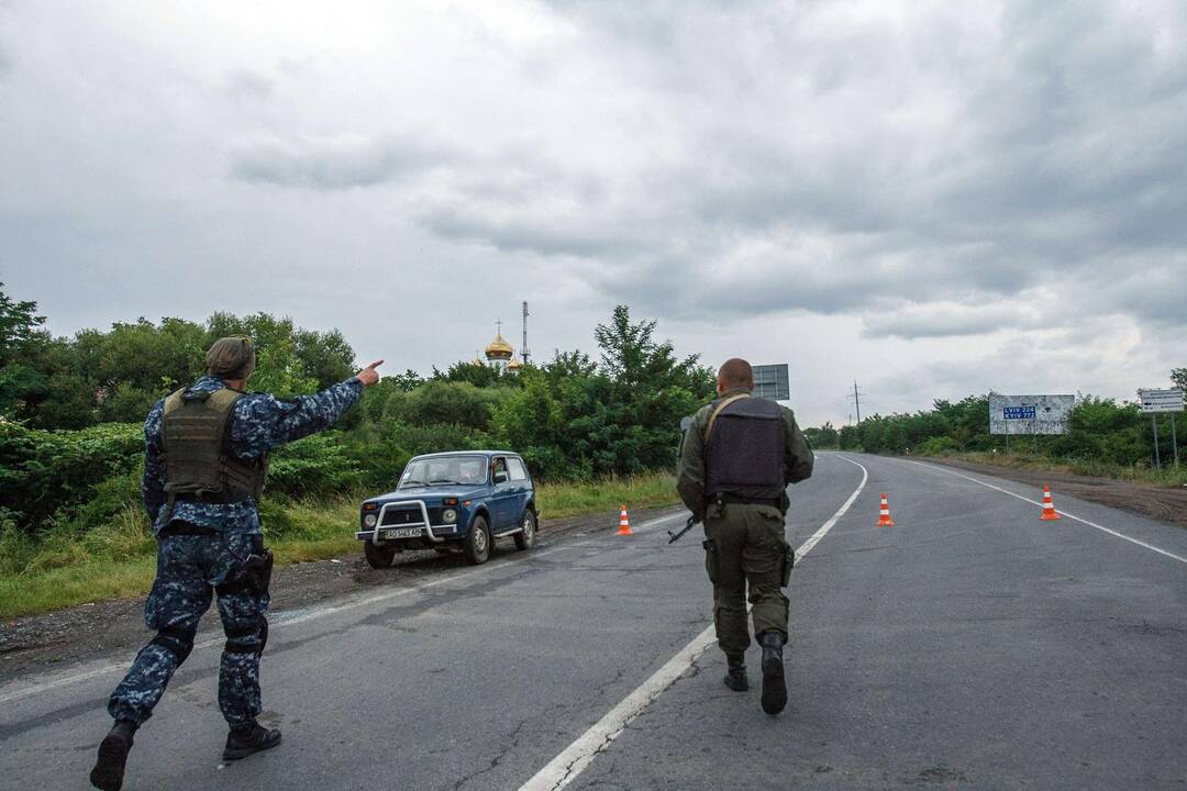 Ukraina: sulaikomas „Dešiniojo sektoriaus“ kovotojas pabėgo sugriebęs vaiką?