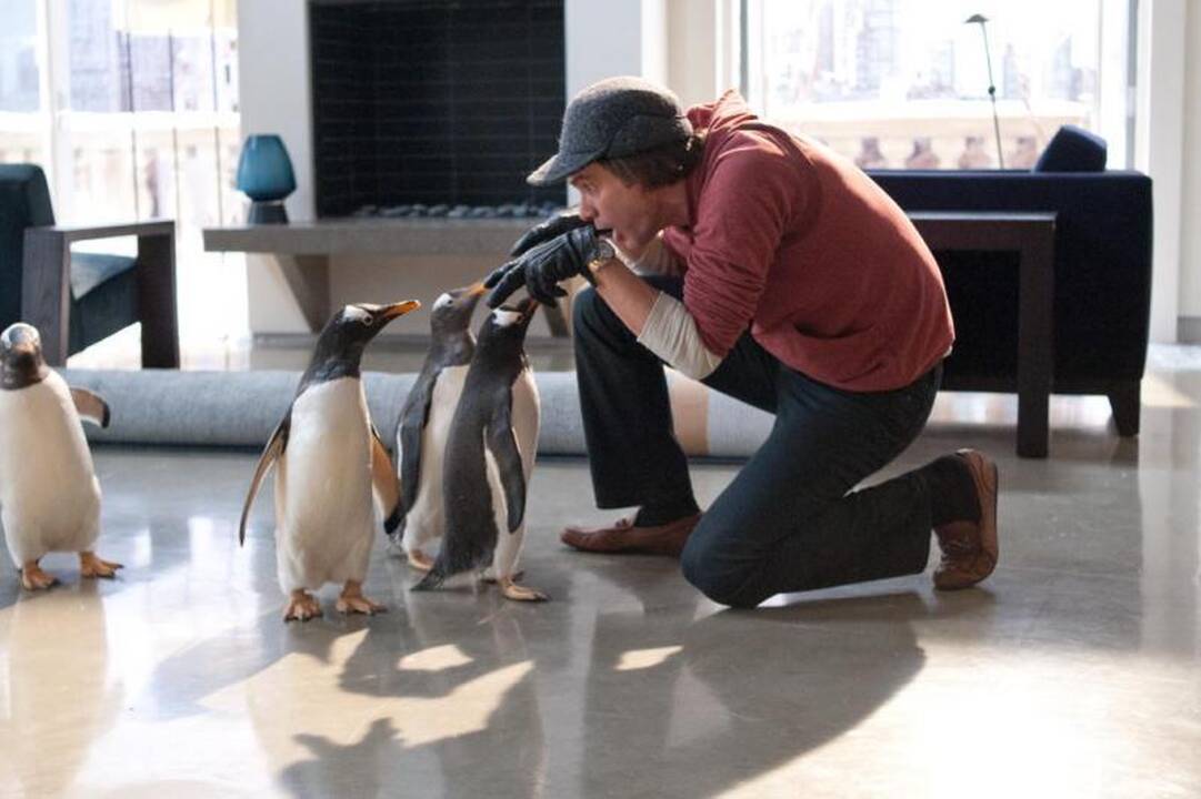 Filmavimo aikštelėje J.Carrey auklėjo pingvinus