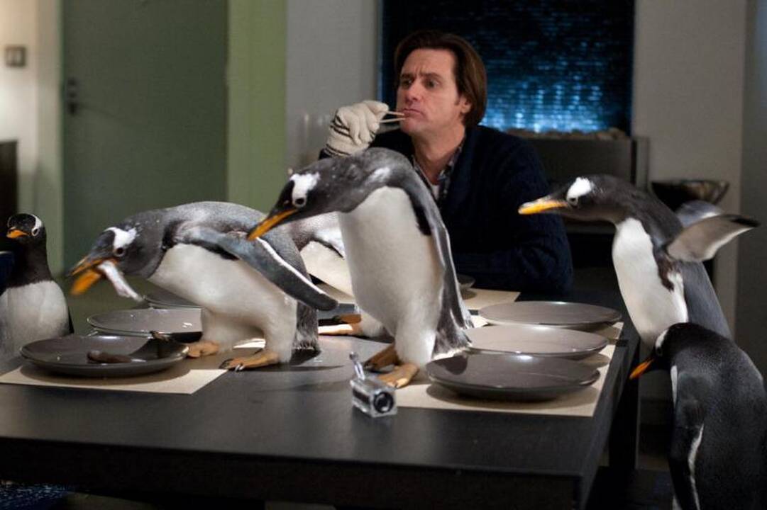Filmavimo aikštelėje J.Carrey auklėjo pingvinus
