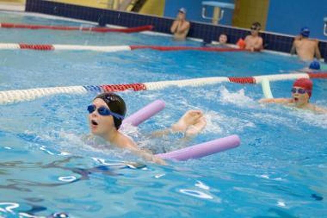 Ignalinos baseine vyko penktasis plaukimo maratonas