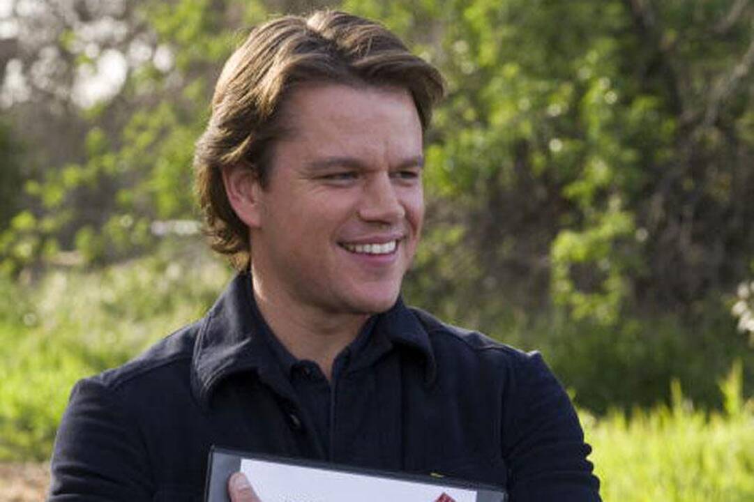 Mattas Damonas bučiuos Michaelą Douglasą