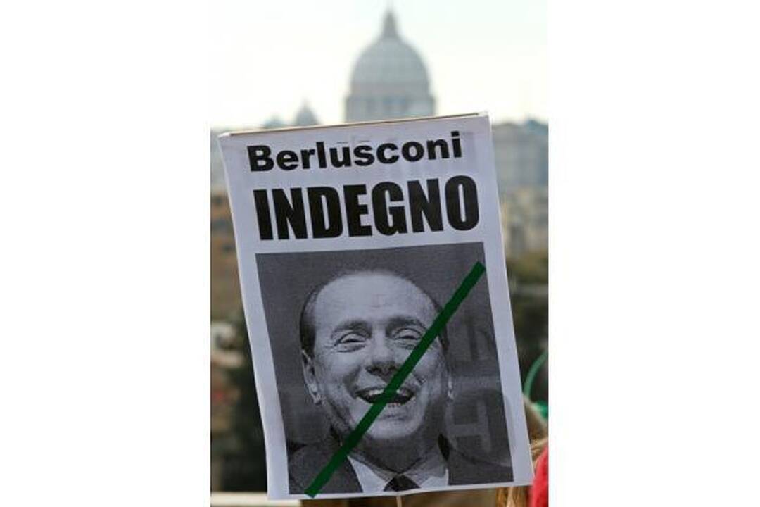 Italijos premjeras numojo ranka į masinį moterų protestą