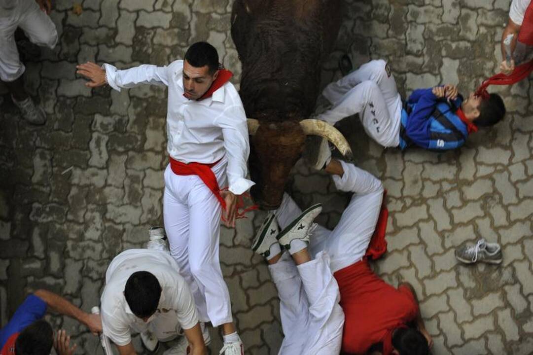 Pamplonoje priešpaskutinės bulių bėgtynes: nukentėjo septyni žmonės