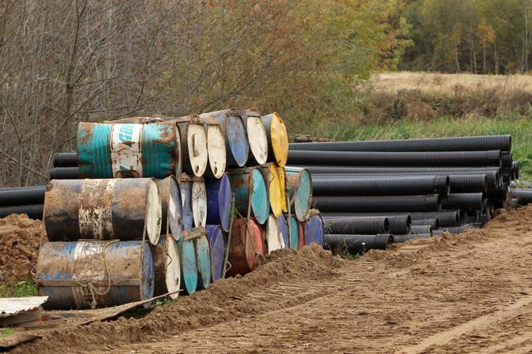 Kariotiškų sąvartyne iš rezervuaro ištekėjo teršalai (atnaujinta)