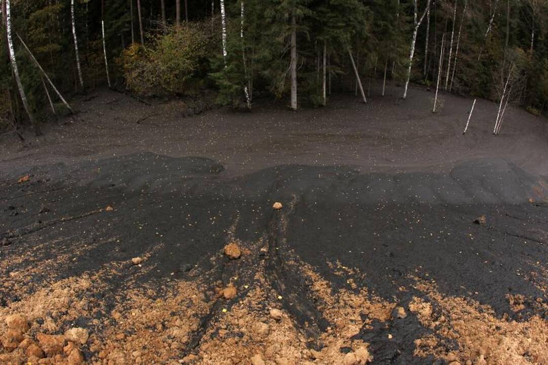 Kariotiškų sąvartyne iš rezervuaro ištekėjo teršalai (atnaujinta)