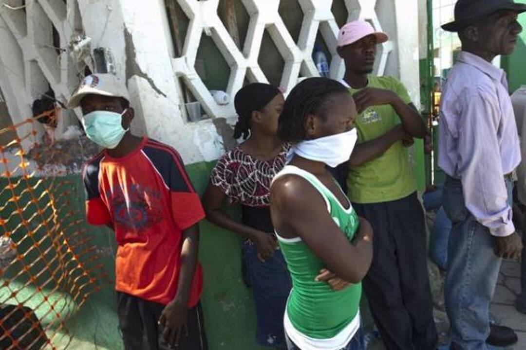 Choleros gniaužtuose atsidūrusius haitiečius kausto baimė ir kančia