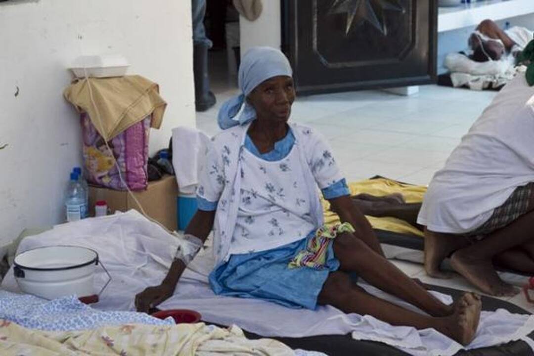 Choleros gniaužtuose atsidūrusius haitiečius kausto baimė ir kančia