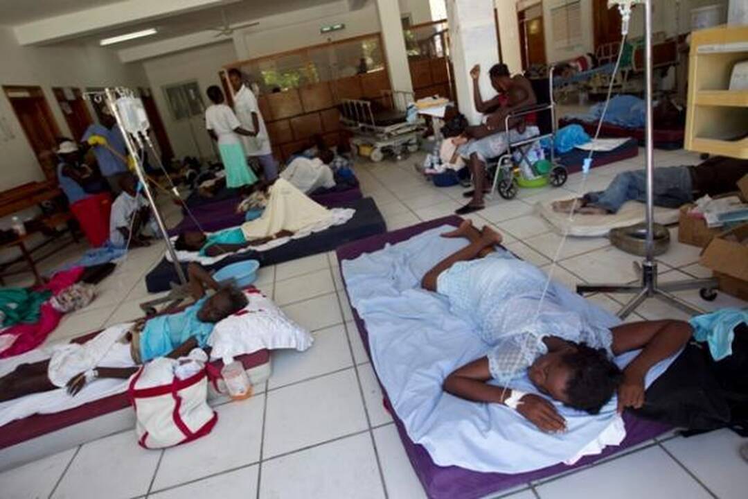 Choleros gniaužtuose atsidūrusius haitiečius kausto baimė ir kančia