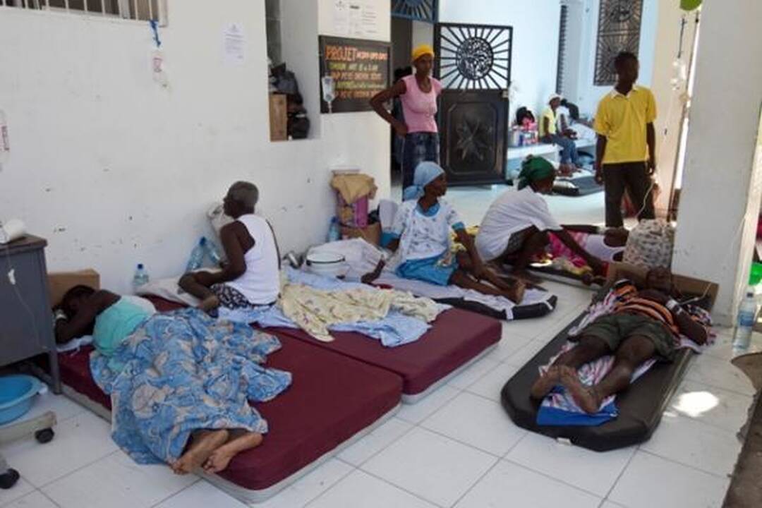 Choleros gniaužtuose atsidūrusius haitiečius kausto baimė ir kančia