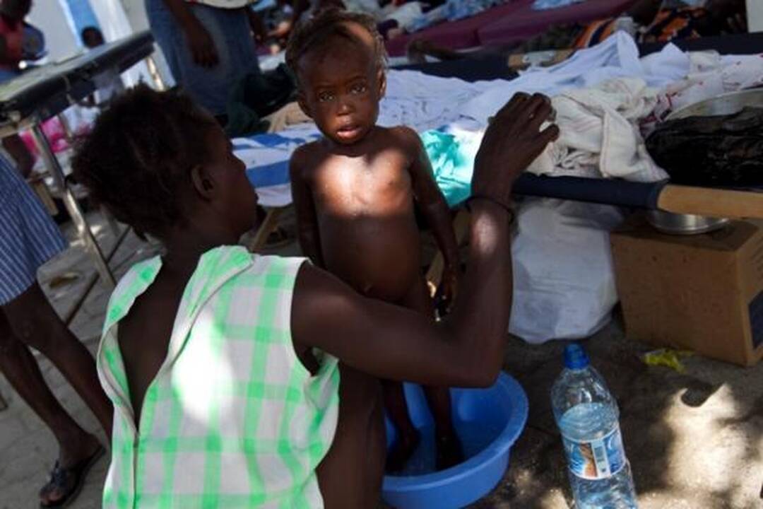 Choleros gniaužtuose atsidūrusius haitiečius kausto baimė ir kančia