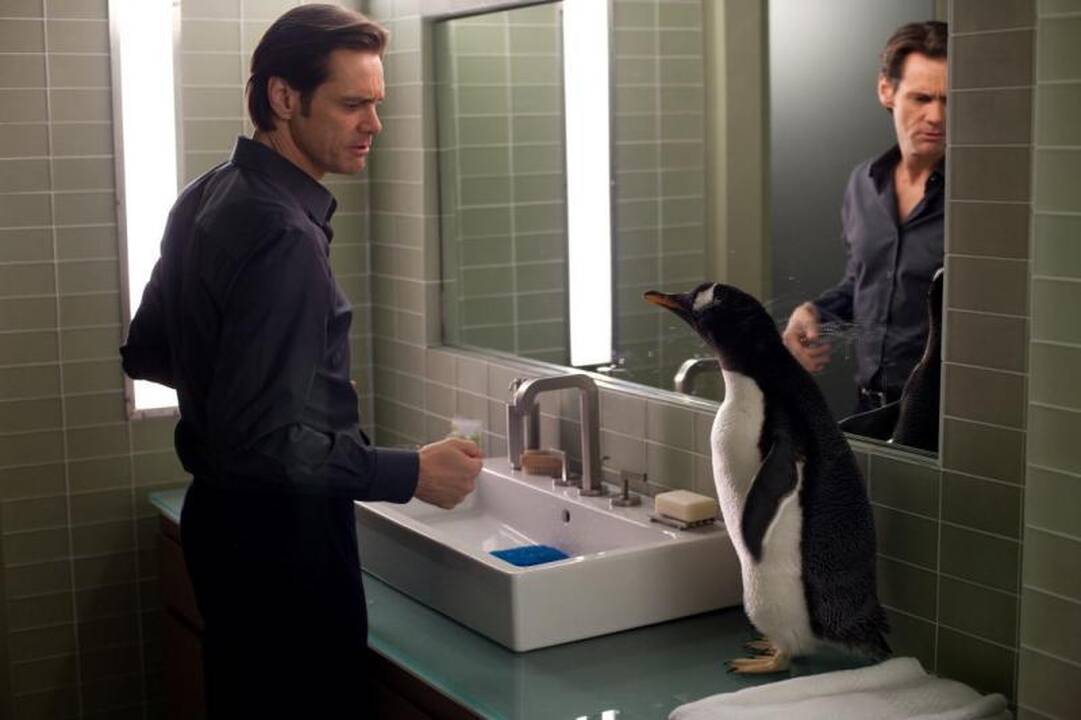 Filmavimo aikštelėje J.Carrey auklėjo pingvinus