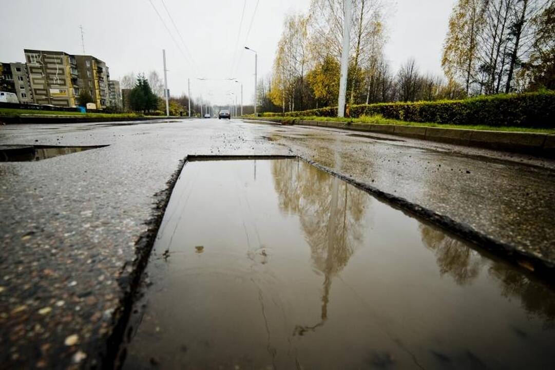 Ašigalio gatvė bus asfaltuojama lyjant? 