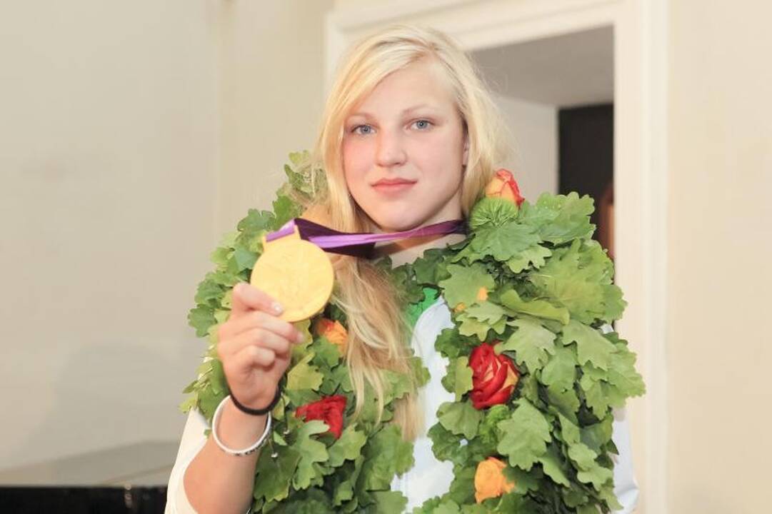 Lietuva pasitiko olimpinį auksą parvežusią R.Meilutytę