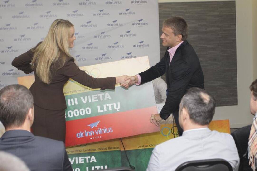 Medalius iškovojusiems olimpiečiams įteiktos premijos