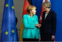 Angela Merkel ir Theresa May
