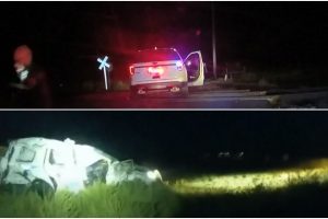 Užfiksuotas šokiruojantis moters sulaikymas: traukinys rėžėsi tiesiai į policininkų automobilį