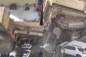 Pribloškiantis vaizdas: įgriuvus stovėjimo aikštelei, automobiliai suvirto į plyšius