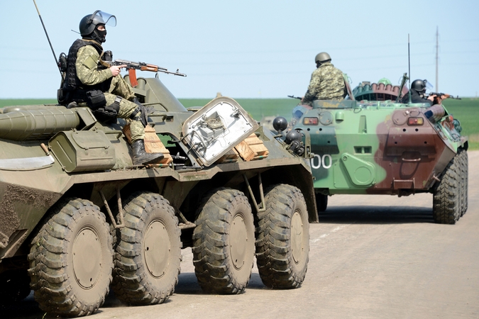 V. Putinas: Rusija atitraukė karius nuo Ukrainos sienos. NATO tai neigia