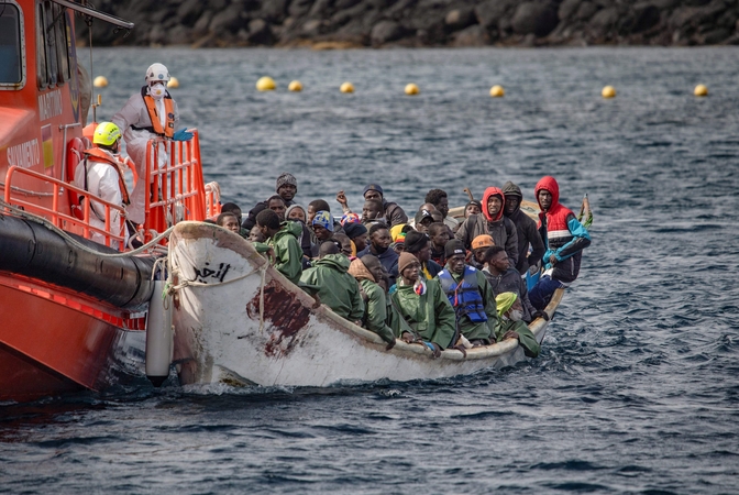 Londonas rengia tarptautines derybas dėl nelegalios migracijos stabdymo