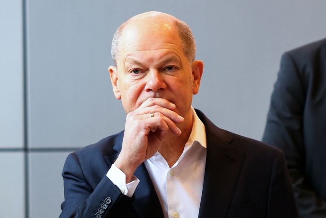 Scholzas: Vokietijoje integravęsi Sirijos pabėgėliai nebus išsiunčiami iš šalies