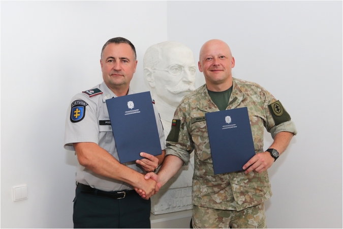 R. Požėla ir L. Idzelis.