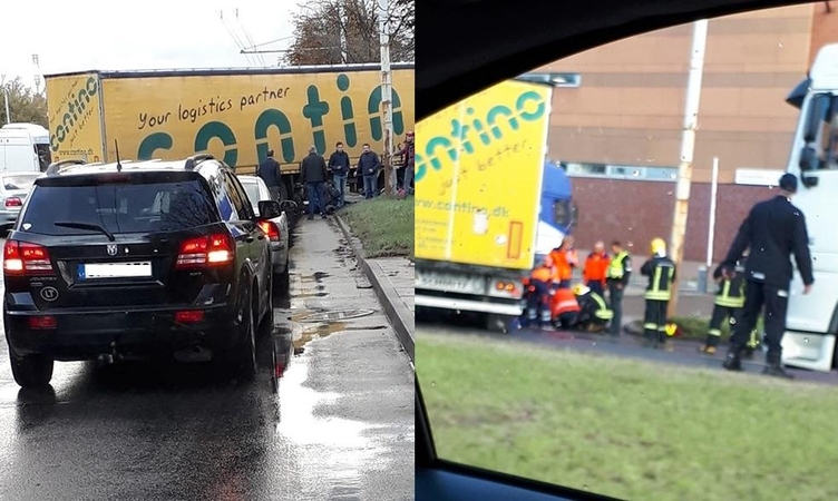 Vilniuje – baisi avarija: po vilkiko ratais palindo motociklas