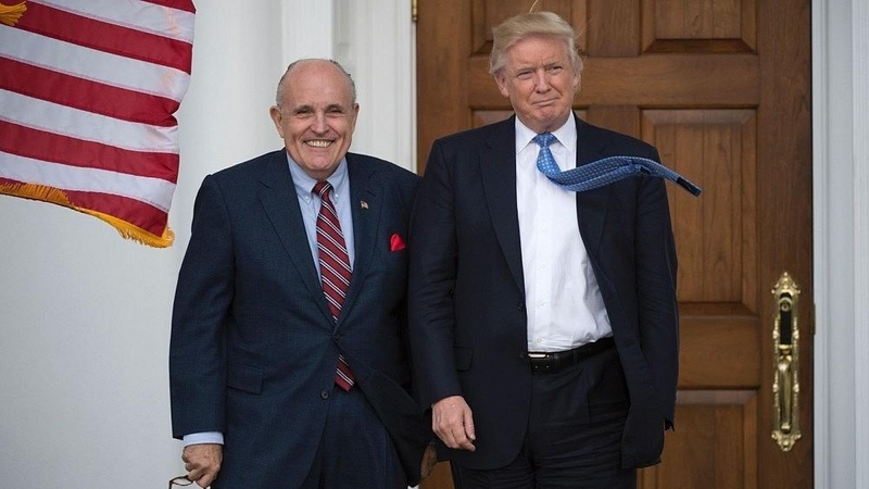 Robertas Muelleris (kairėje) ir Donaldas Trumpas (dešinėje)
