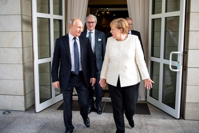 Vladimiras Putinas ir Angela Merkel.