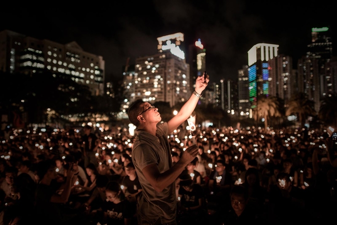 Honkonge vyko Pekine draudžiamas Tiananmenio aikštės žudynių minėjimas