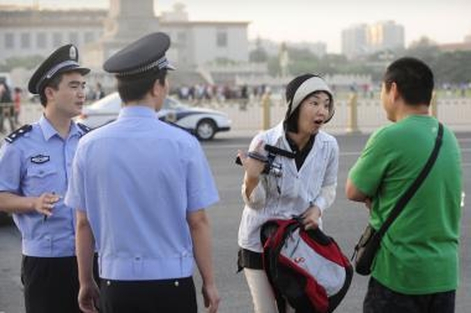 Į Tiananmenio aikštę žurnalistų neleidžia