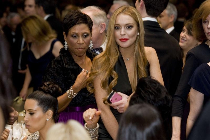 Holivudo žvaigždutė Lohan nusifotografavo žurnalui su savo advokate