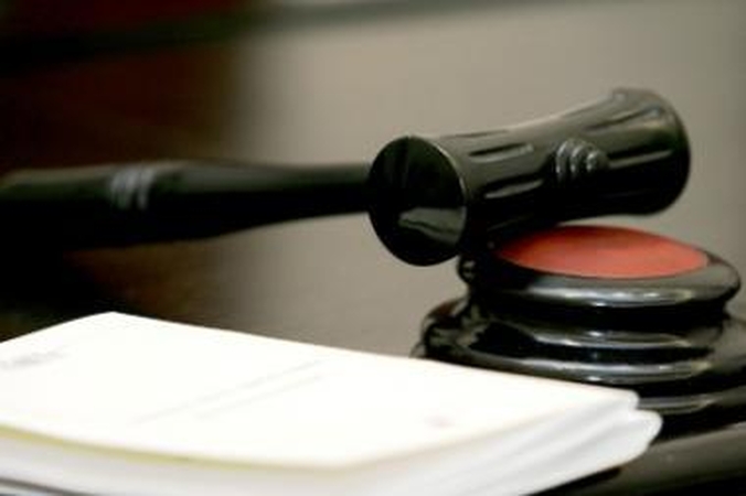 Libijoje du šveicarų verslininkai nuteisti kalėti 16 mėnesių