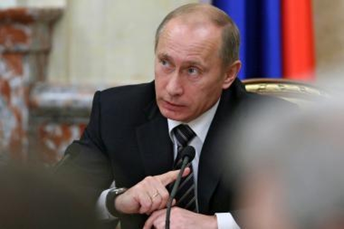 V.Putinas smerkia pareiškimus, kad M.Kadhafi reikia sunaikinti