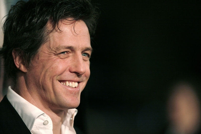 Hugh Grantas kratysis romantiko etiketės