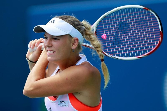Pergalingai turnyre JAV žaidžia K.Wozniacki