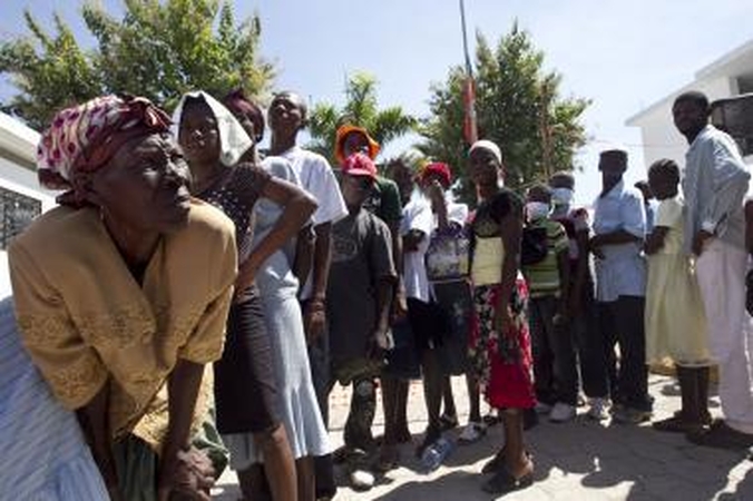 Choleros gniaužtuose atsidūrusius haitiečius kausto baimė ir kančia