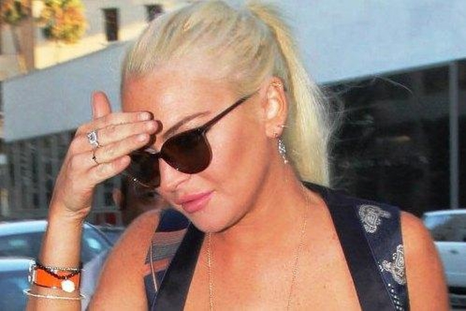 L.Lohan padavė į teismą reperį Pitbull